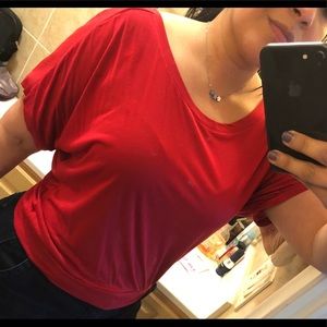 Red, short sleeve with partly sheer overlay.